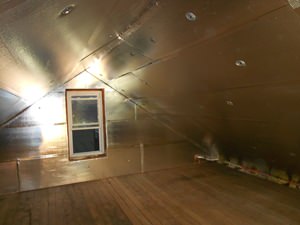 A Weirton attic with SuperAttic installed.